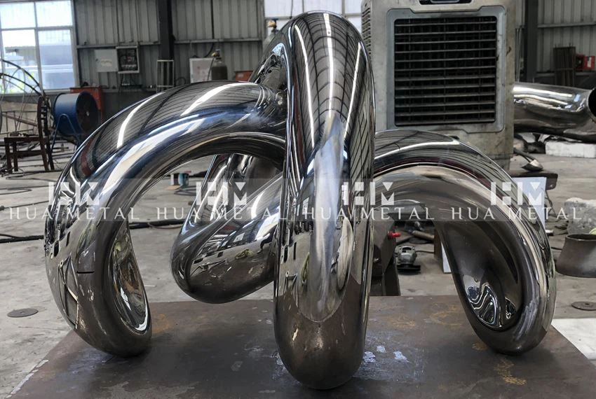 preliminary polishing of stainless steel crab sculpture